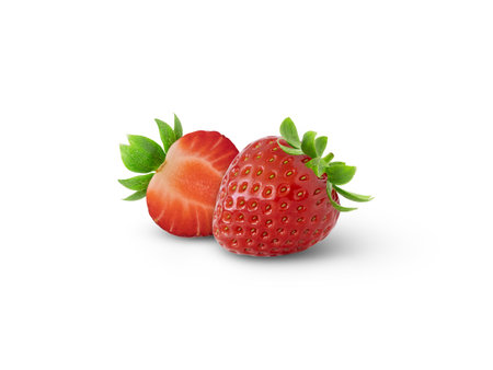 Ripe strawberries isolated. Sweet strawberries and half a berry on a white background.の写真素材