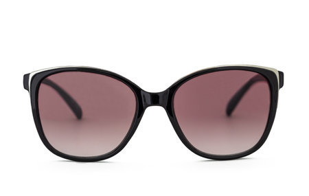 Sunglasses with a pink lenses in a black frame isolated on a white backgroundの写真素材