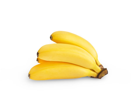 Ripe banana isolated with shadow. Bunch of bananas isolated.の写真素材