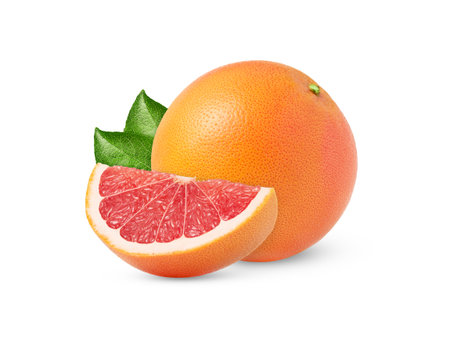 Grapefruit and a slice isolated with leaves.の写真素材