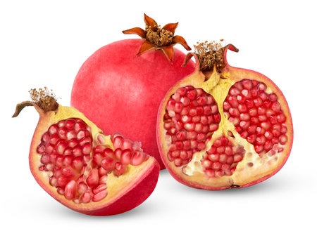 Ripe fresh pomegranate with half and chunk isolated. Piece of pomegranate fruit isolated,の写真素材