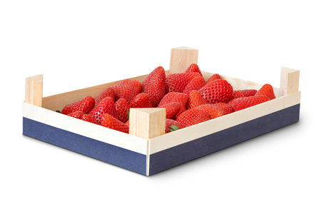 Fresh red strawberry berries in wooden box. Isolatedの写真素材
