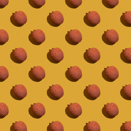 Lychee fruit on a yellow background, lychees patternの写真素材