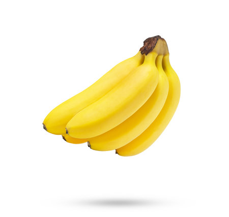 Levity baby banana isolated on white background. Floating bunch of bananas isolated.の写真素材