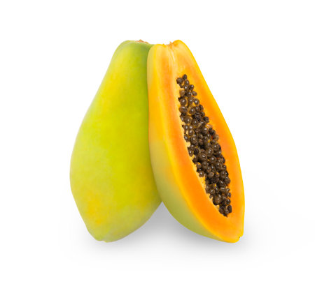 Halves of papaya fruit vertically standing isolated.の写真素材