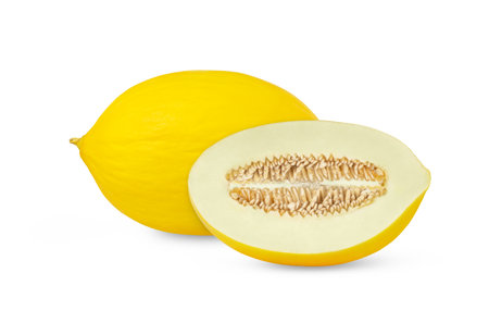Yellow ripe melon and cut in half with seeds isolated.の写真素材