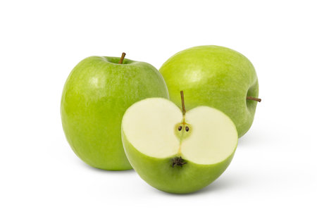 Group of ripe green apples and apple half isolatedの写真素材