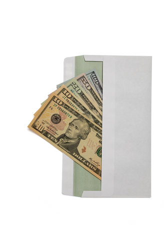 Envelope with dollars banknotes isolated on white.の写真素材