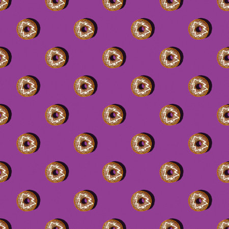 Seamless pattern with chocolate donuts on the violet background.