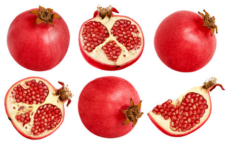 Set of ripe fresh pomegranates isolated. Whole pomegranate, half of pomegranate and cut in a slice of pomegranate over white background.の写真素材