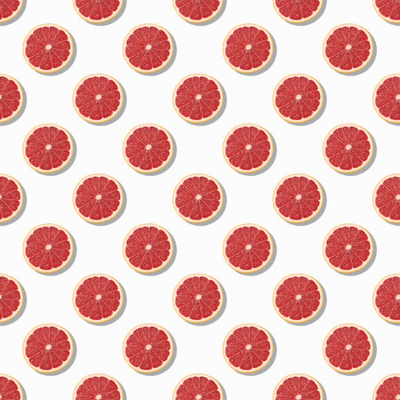 Creative citrus fruits foods, candy seamless pattern. Pink citrus fruit on white background. Fresh grapefruit slice on white background.の写真素材