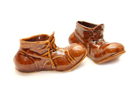 Souvenir - ceramic Shoes on a white backgroundの写真素材