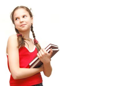 The girl in the red holds booksの写真素材