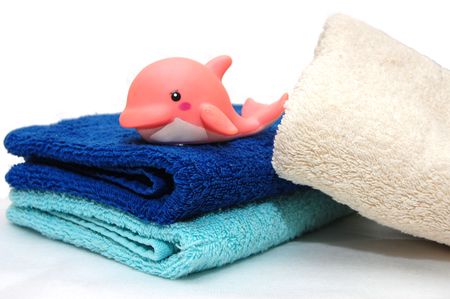The combined colour towels with a toyの写真素材
