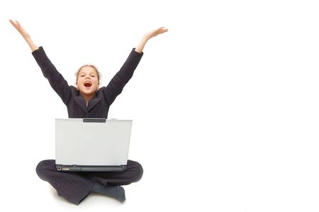 casual success girl on a laptop - isolated over a white backgroundの写真素材