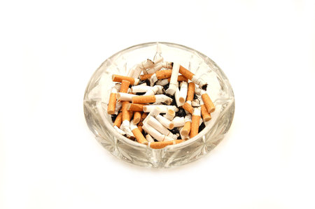 Ashtray full of cigarette buttsの写真素材