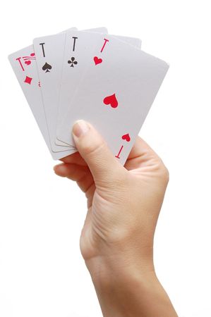 Players hand revealing Four Aces

の写真素材