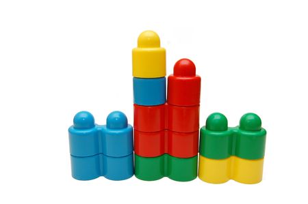 Plastic multi-colored geometrical figures on a white backgroundの写真素材