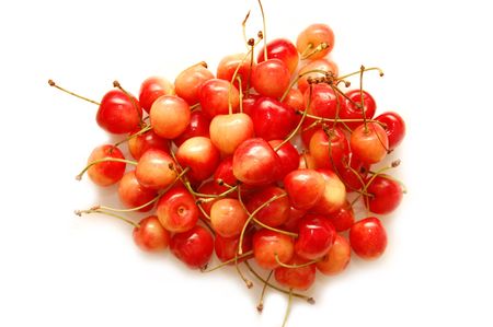 Ripe red cherries shot on a white background
の写真素材