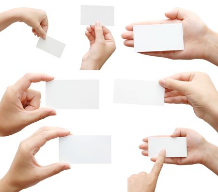 Set of hand holding an empty business card over whiteの写真素材