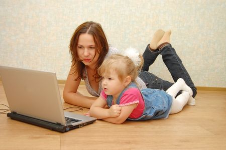 Mother and Daughter Using Laptopの写真素材
