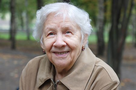 Beautiful portrait of an elder woman outdoors
の写真素材
