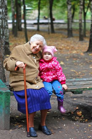 portrait of a grandmother and granddaughter in the parkの写真素材