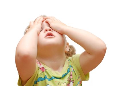  little girl has closed eye handsの写真素材