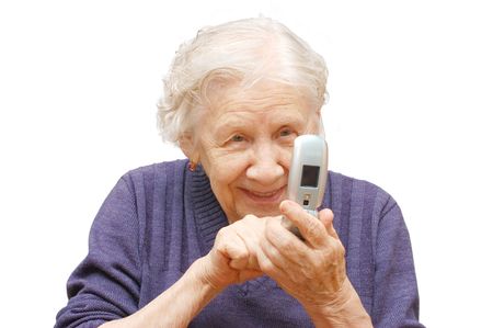 grandmother studies phone on an isolated backgroundの写真素材