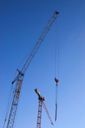 The elevating crane against the blue skyの写真素材