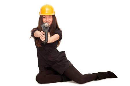Girl in a helmet with a drill
の写真素材