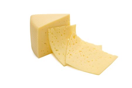 Cheese piece isolated on white backgroundの写真素材