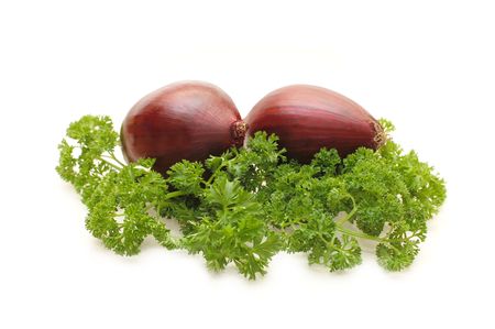 Red onions and parsley isolated on whiteの写真素材