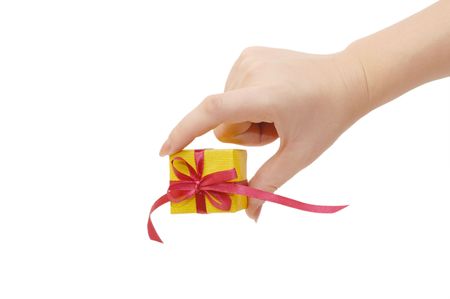 Box with a gift in a handの写真素材
