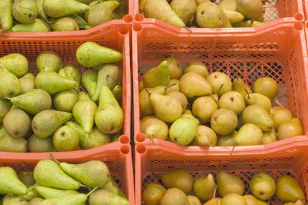Boxes with pears in a supermarketの写真素材