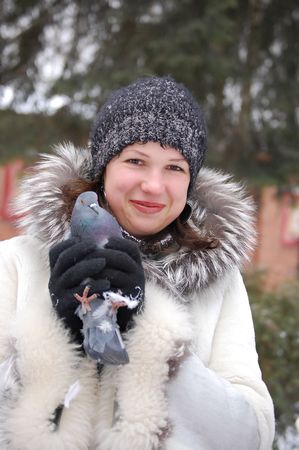Portrait of the Russian girl with a pigeonの写真素材
