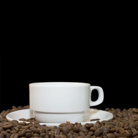 Cup from coffee on coffee grainsの写真素材