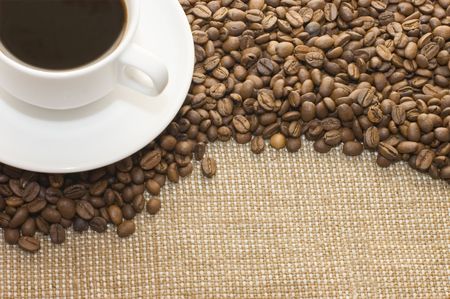 Cup from coffee on coffee grains
の写真素材