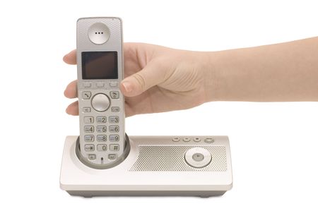 Radio phone in a female hand isolated の写真素材