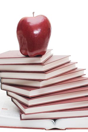 Stack of books and apple isolatedの写真素材