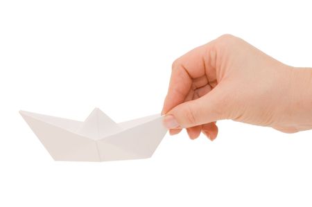 Paper ship in a female handの写真素材