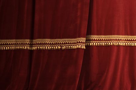 Theater stage red curtains with light and shadow
の写真素材