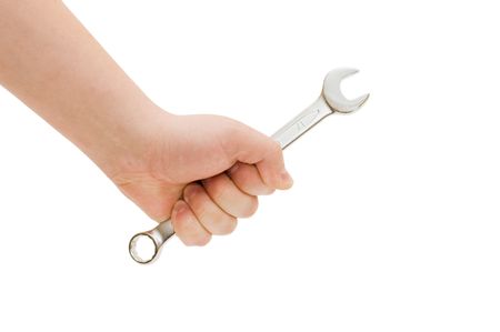 silver spanners in a man hand isolated の写真素材