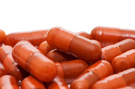 Heap of pills isolated on white background
