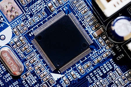 Close up of computer circuit board in blue の写真素材