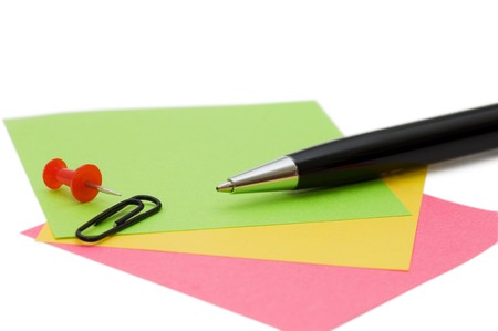 Pen and note isolated on white background の写真素材