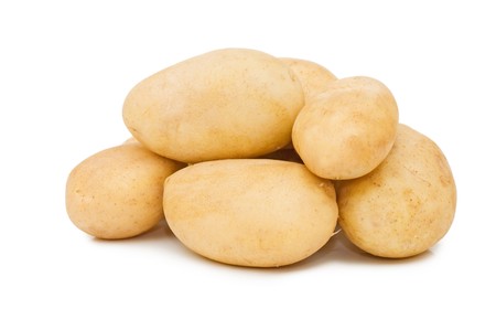 bunch of potatoes on white background close up shoot の写真素材