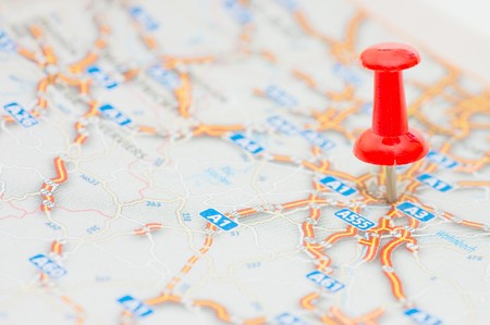 Red pushpin marking a locationの写真素材