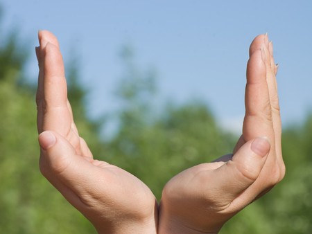 abstract conception with hands towards sky の写真素材