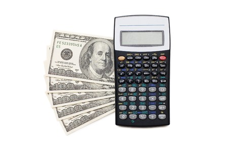 Calculator and money isolated on white backgroundの写真素材